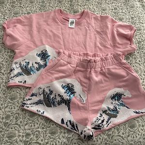 QOS xs waves set. Top was worn once for 1 hour and bottoms nwot